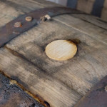 The top of a barrel with bung in place