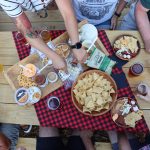 Group of people eating chips